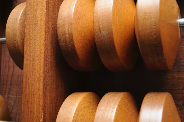 Closeup of six wooden lower beads and one upper bead pushed against the crossbar. CC0 waiver: To the extent possible under law, I waive all copyright and related or neighboring rights to this work. Business vocabulary metrics that predict anything