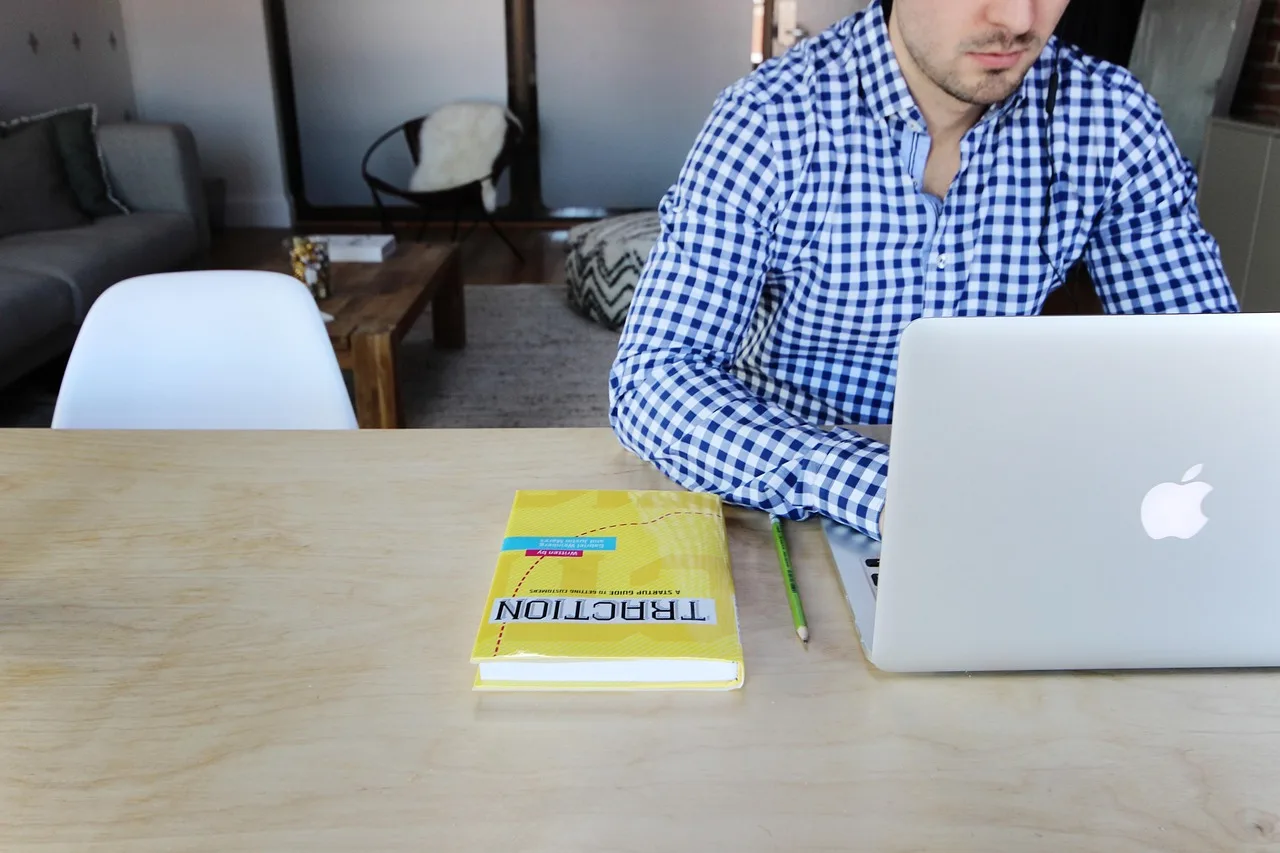 macbook, laptop, computer, technology, business, office, desk, table, guy, man, working, typing, book. Corporate jargon case study: what a repair must add to four paragraphs
