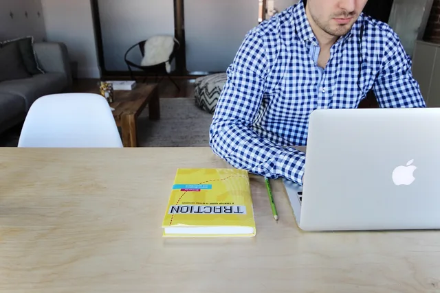 macbook, laptop, computer, technology, business, office, desk, table, guy, man, working, typing, book. Corporate jargon case study: what a repair must add to four paragraphs