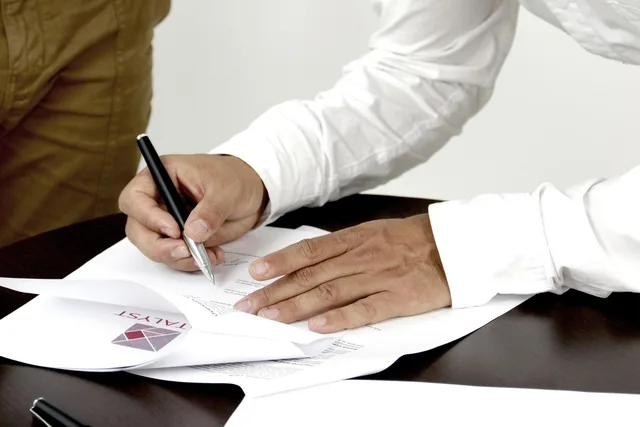 firm, contract, person signing a document, firm, contract, contract, contract, contract, contract. Reading a US cap table in plain terms, from SAFE to 409A